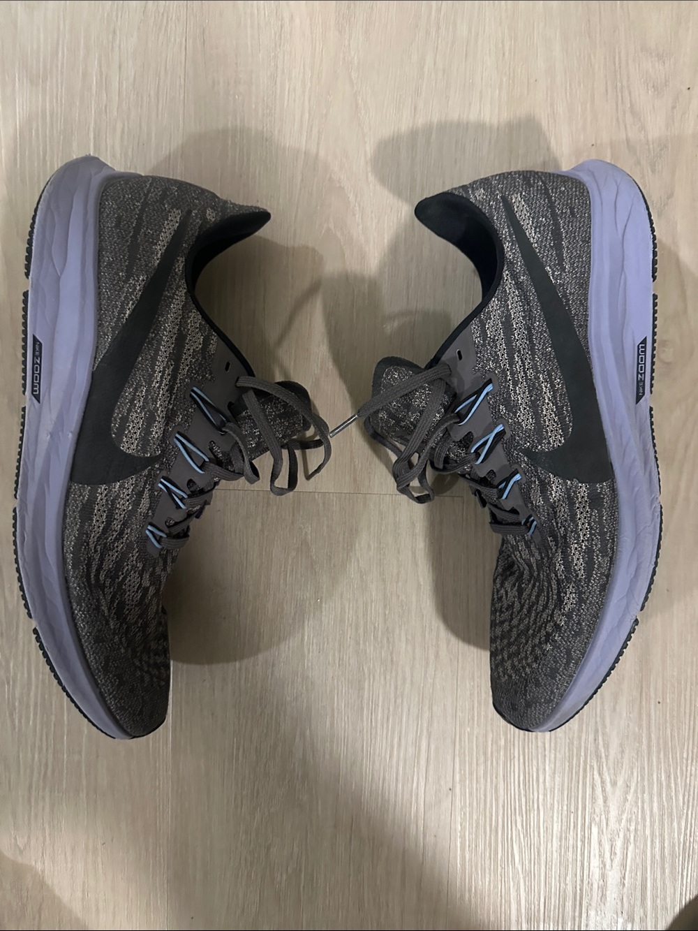 Nike Men's Grey/Black Knit Running Sneakers with Subtle Blue Accents